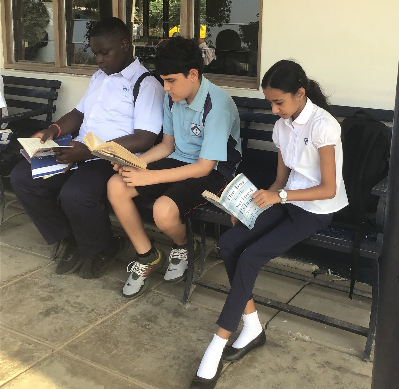 Students reading on world book day.jpg